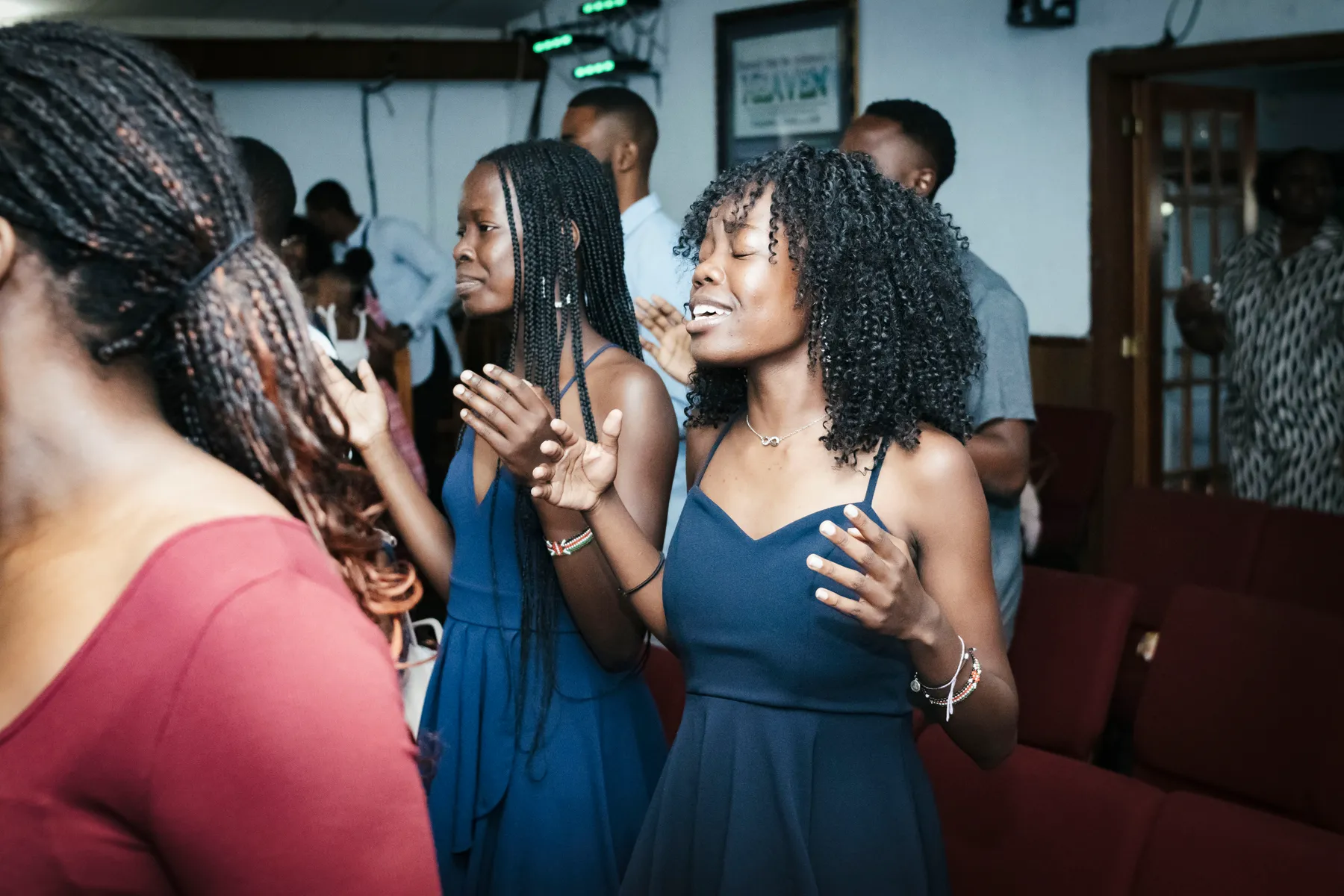 Friends sharing a joyful moment at Victory House