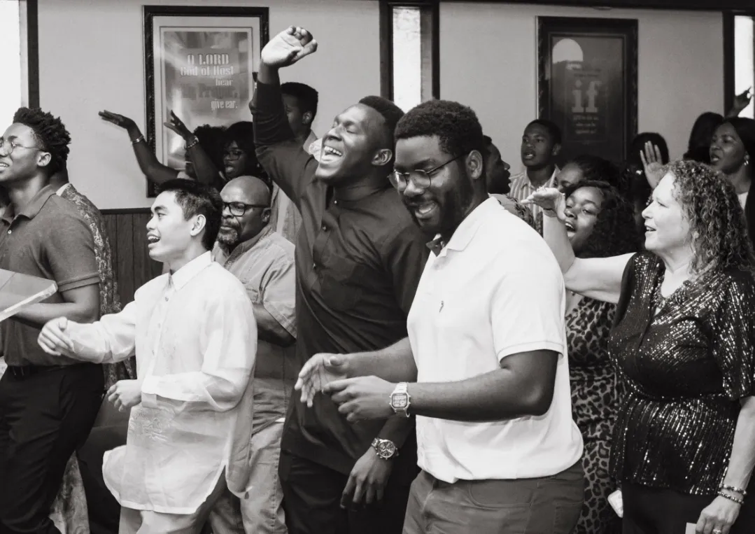 The Victory House congregation praising together